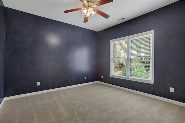 1215 Wynridge Xing, Alpharetta, GA 30005 - spare room with carpet flooring, ceiling fan, and baseboards