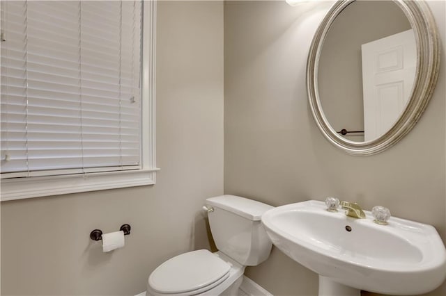 1215 Wynridge Xing, Alpharetta, GA 30005 - half bath with toilet, a sink, and baseboards