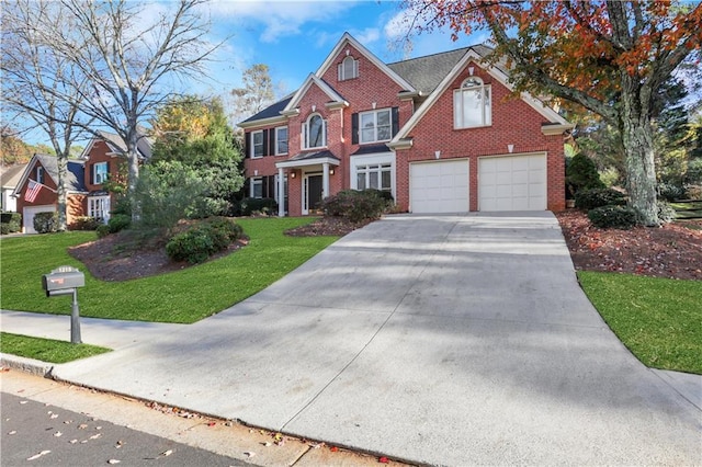 1215 Wynridge Xing, Alpharetta, GA 30005 - view of front of home with an attached garage, brick siding, driveway, and a front lawn