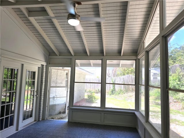 unfurnished sunroom with vaulted ceiling