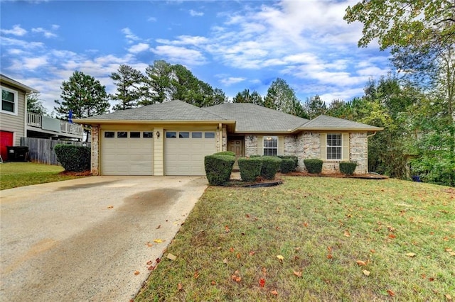 view of front facade with a garage and a front lawn