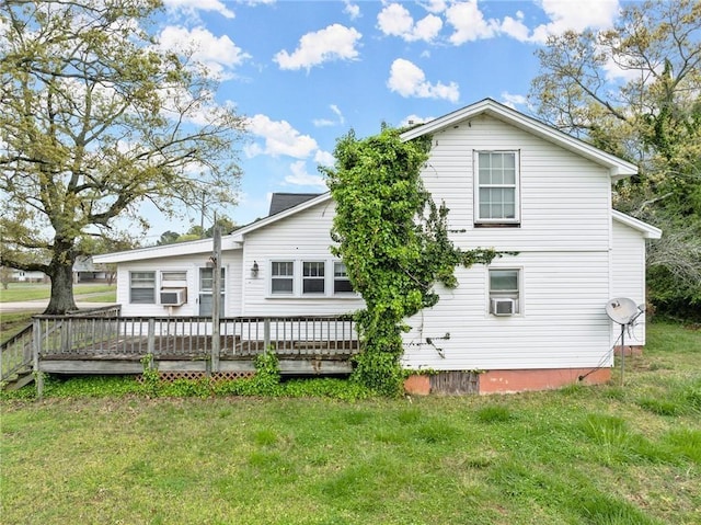 back of house featuring a yard, cooling unit, and a deck