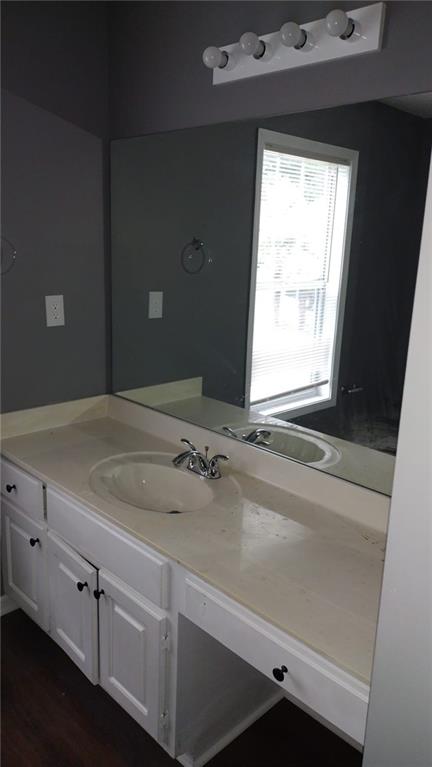 laundry room with washer hookup, wood-type flooring, and hookup for an electric dryer