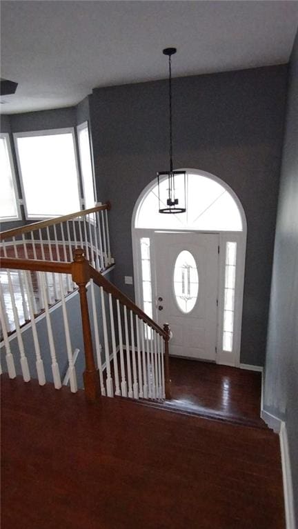 entryway with wood-type flooring