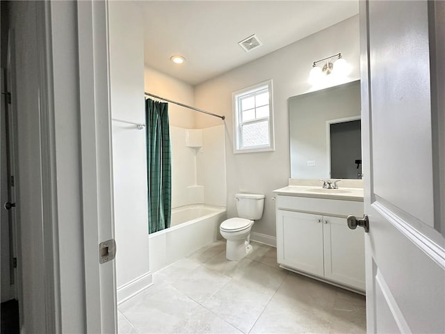 full bathroom featuring tile patterned flooring, vanity, toilet, and shower / bath combination with curtain