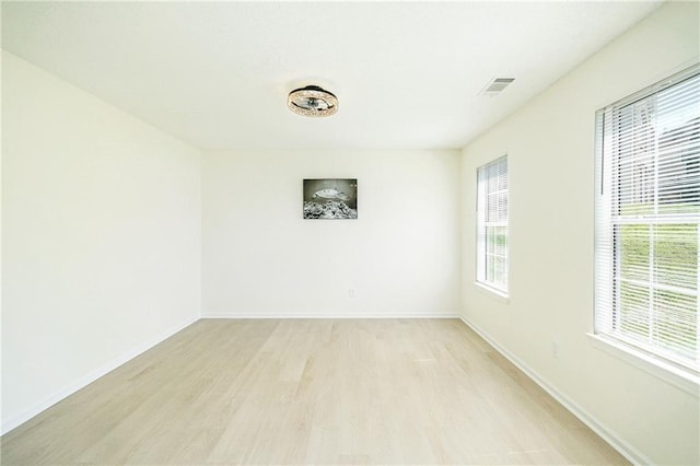 kitchen featuring white cabinetry, visible vents, decorative backsplash, stainless steel appliances, and marble finish floor