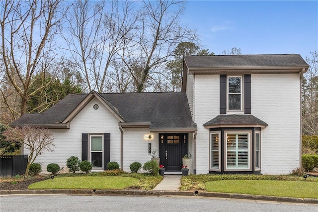 front facade with a front yard