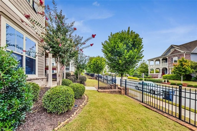 view of yard featuring a balcony