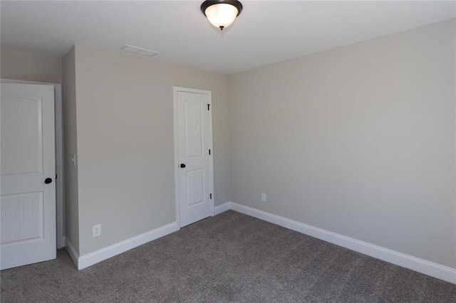 unfurnished room featuring carpet floors