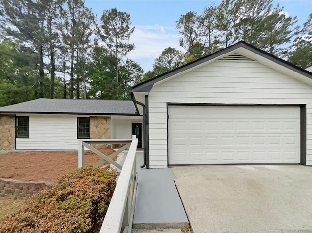 ranch-style home with a garage