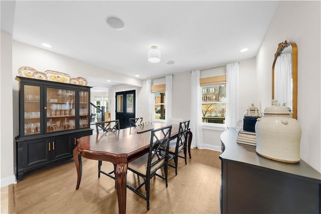 dining room with light wood-type flooring