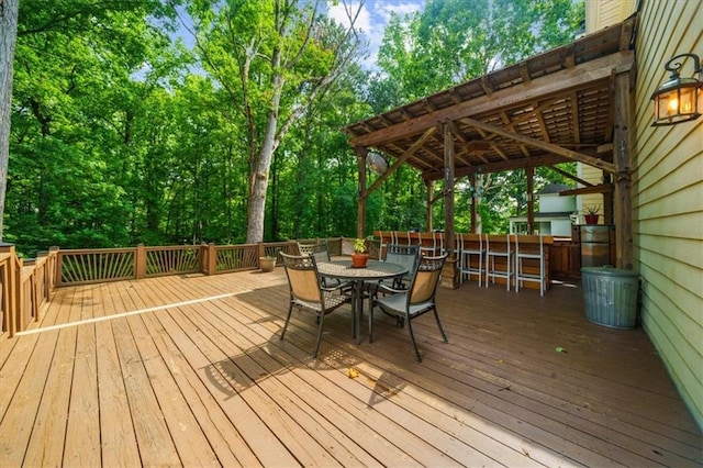 wooden terrace featuring an outdoor bar