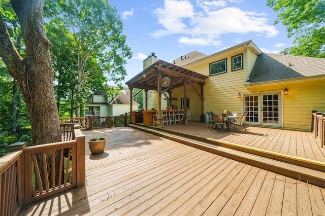 wooden deck with a pergola