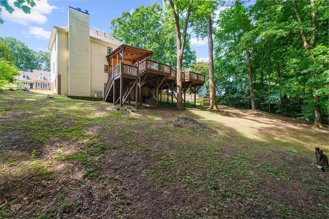 back of property with a deck