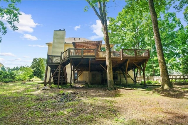 back of property featuring a deck