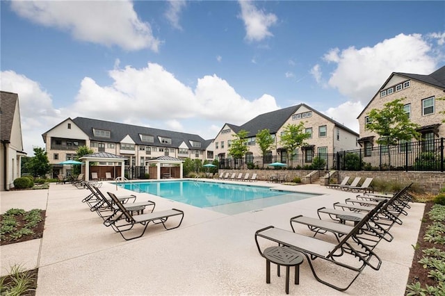 view of swimming pool featuring a gazebo and a patio