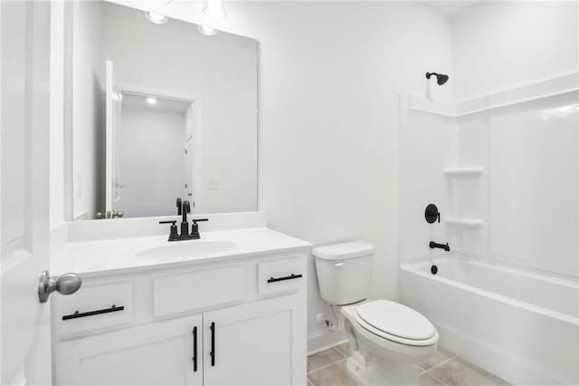 full bathroom featuring tile patterned flooring, vanity, bathing tub / shower combination, and toilet