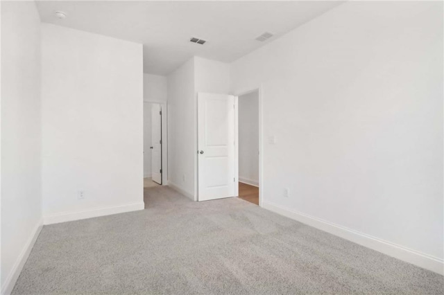 spare room with carpet