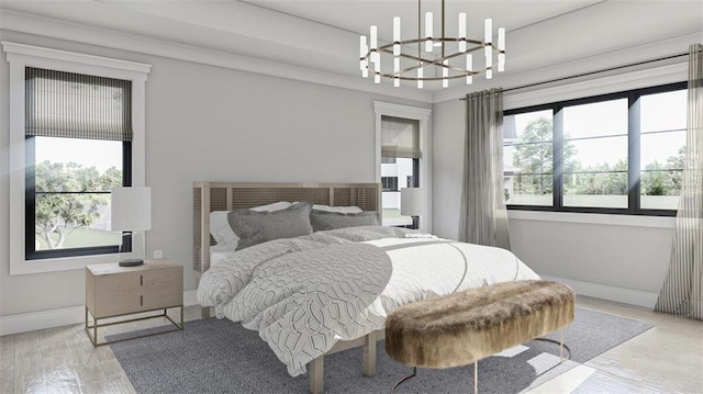 bedroom with light hardwood / wood-style floors and a notable chandelier