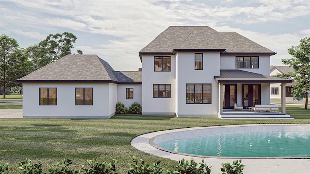 rear view of property with a patio area and a lawn