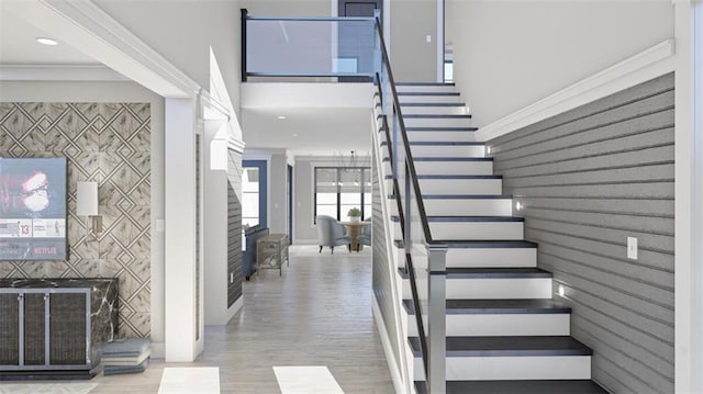 entrance foyer featuring crown molding