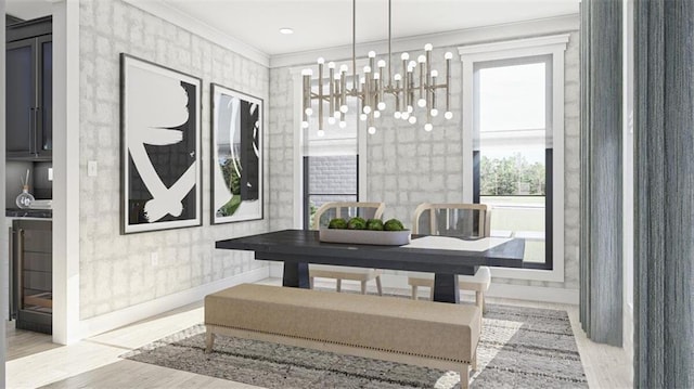 dining space with crown molding, a chandelier, and light hardwood / wood-style flooring