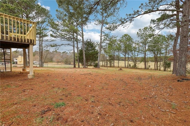 view of yard featuring a deck