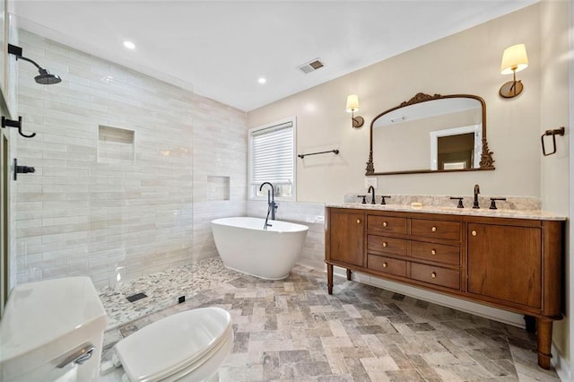 full bathroom with vanity, independent shower and bath, tile walls, and toilet