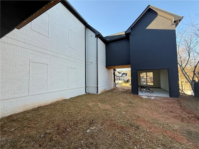 back of property with a patio area