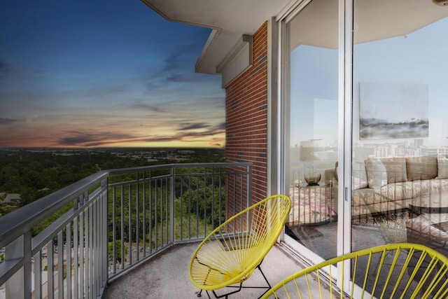 view of balcony at dusk