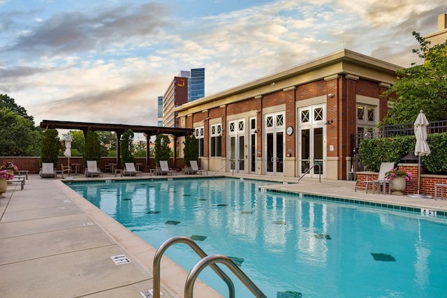 view of swimming pool featuring a patio