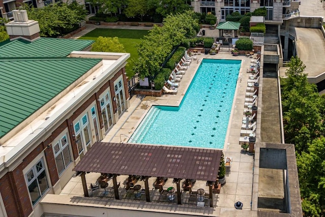 view of swimming pool featuring a pergola and a patio area