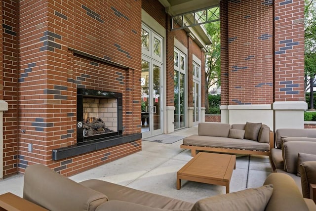 living room featuring a multi sided fireplace