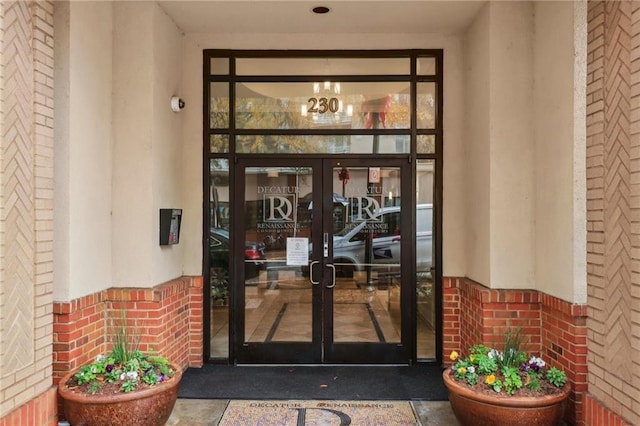 doorway to property featuring french doors