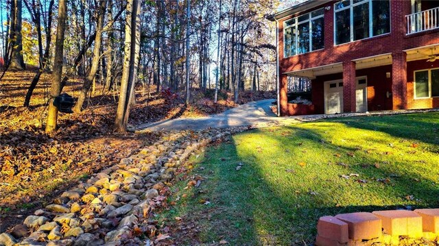 view of yard featuring a garage