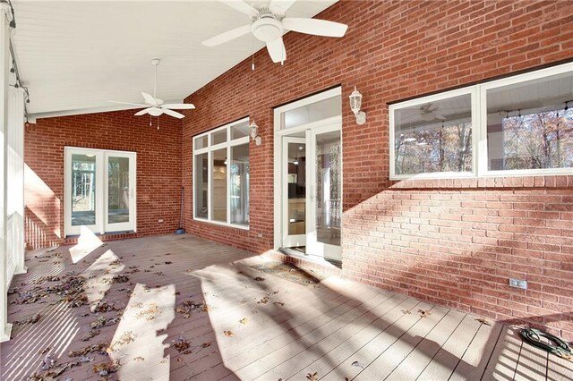 wooden terrace featuring ceiling fan