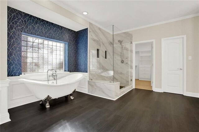 bathroom with crown molding, plus walk in shower, and wood-type flooring