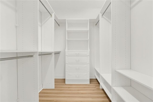 walk in closet featuring light wood-type flooring