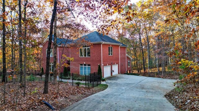 view of home's exterior with a garage