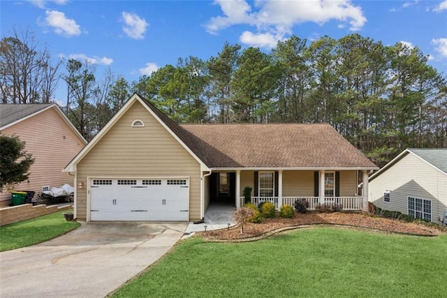 view of front of property featuring a garage, covered porch, and a front lawn