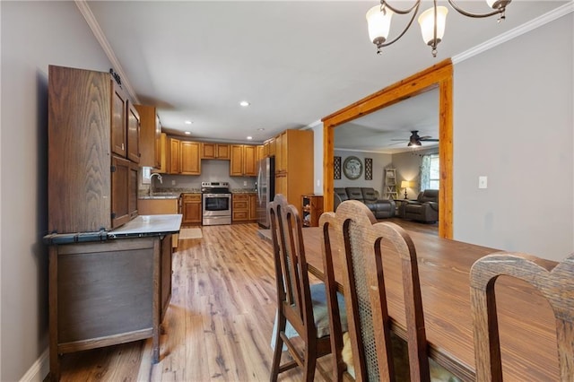 4968 Moores Mill Ln, Waleska, GA 30183 - dining area with ornamental molding, light wood finished floors, recessed lighting, ceiling fan, and a chandelier