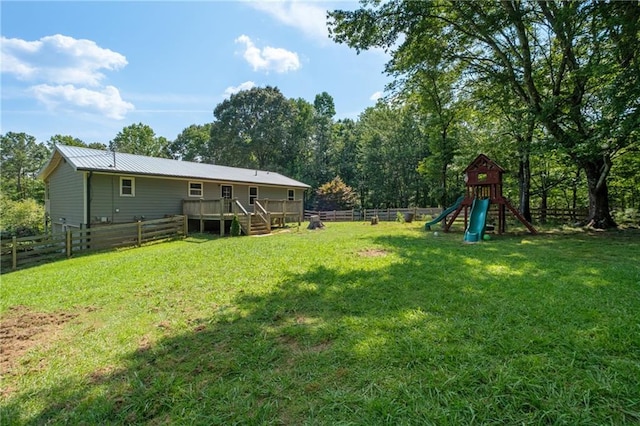 4968 Moores Mill Ln, Waleska, GA 30183 - fenced backyard featuring a playground, a wooden deck, and stairway