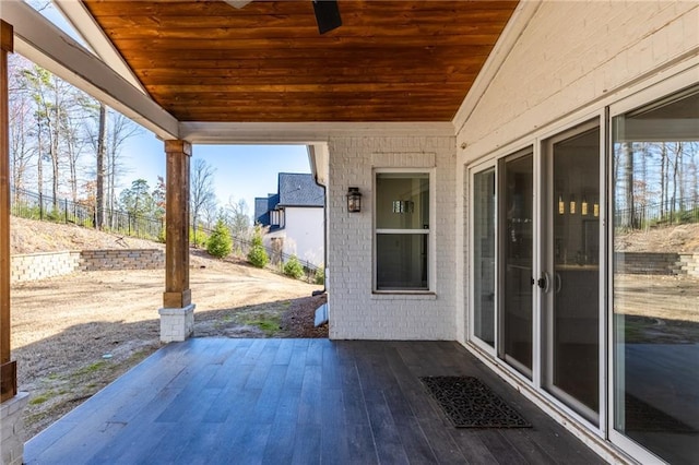 view of patio featuring fence