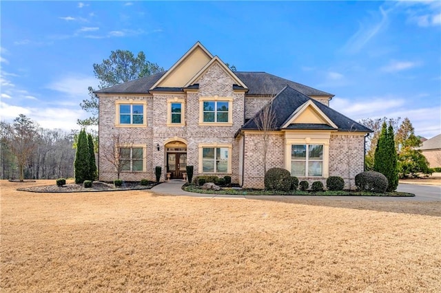 view of front facade with a front lawn