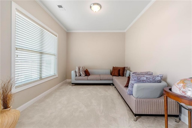 sitting room featuring light carpet and crown molding