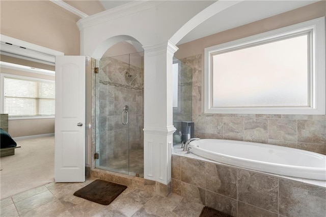 bathroom with ornamental molding, independent shower and bath, and ornate columns