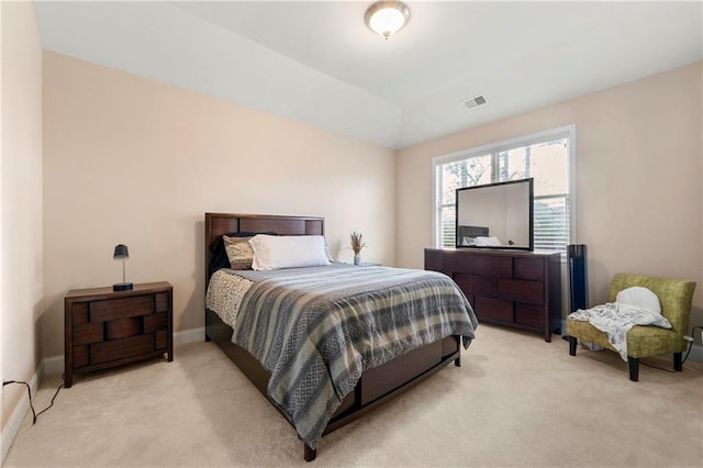 carpeted bedroom featuring vaulted ceiling