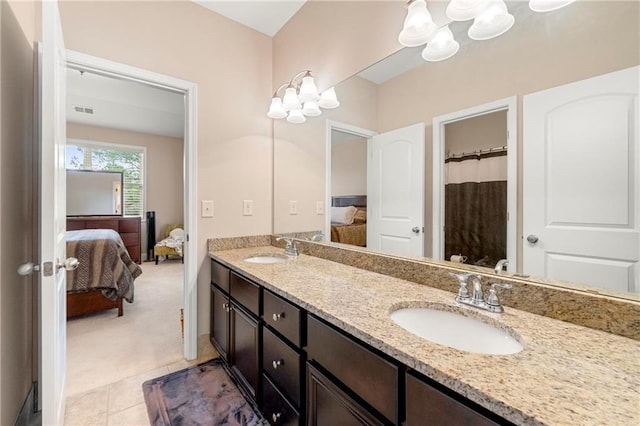 bathroom with vanity and tile patterned floors