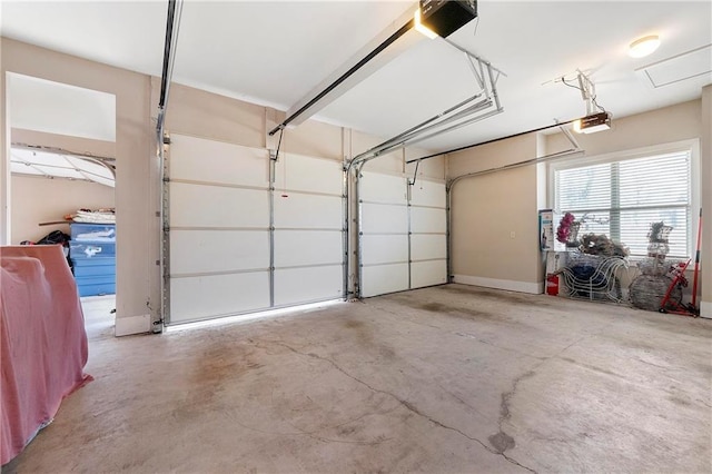 garage featuring a garage door opener