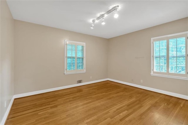 1618 Mason Mill Rd NE, Atlanta, GA 30329 - unfurnished room featuring wood finished floors and baseboards